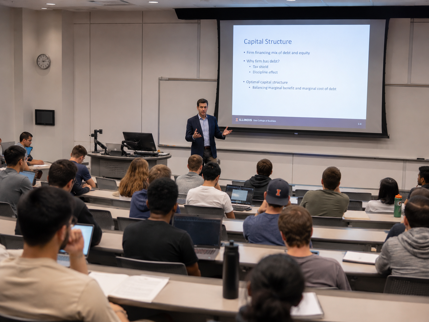 College lecture classroom with students and presentation screen